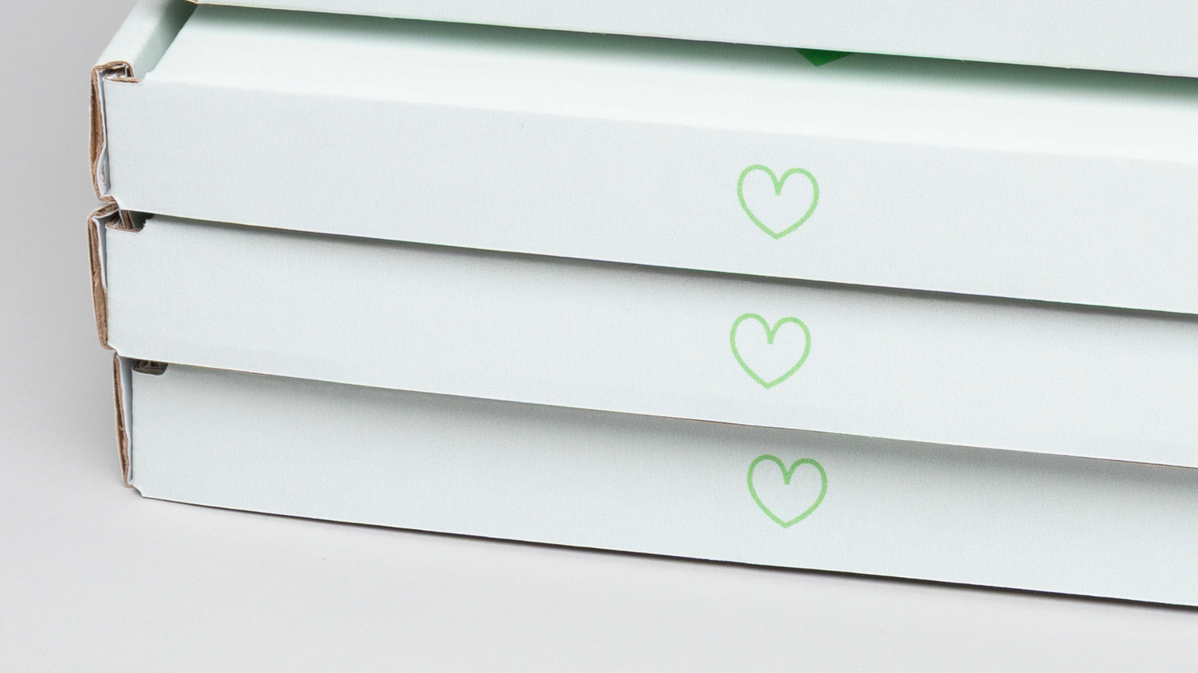 ein herz auf der Öffnungslasche des Print Mailings als liebevolles Detail